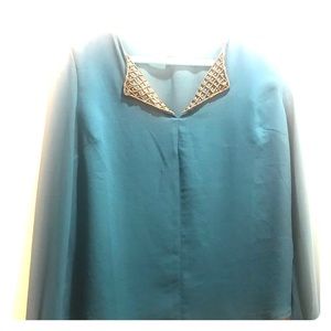 Teal blouse with gold embellishments